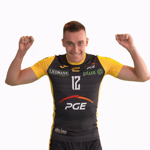 A Man Wearing A Black And Yellow Pge Jersey GIF