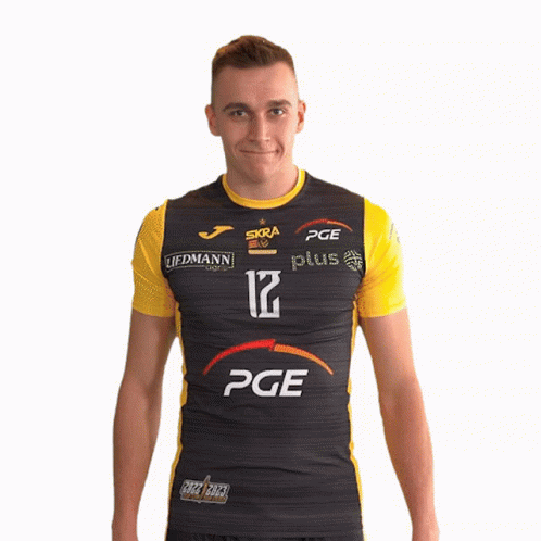 A Man Wearing A Black And Yellow Shirt With Pge On It GIF