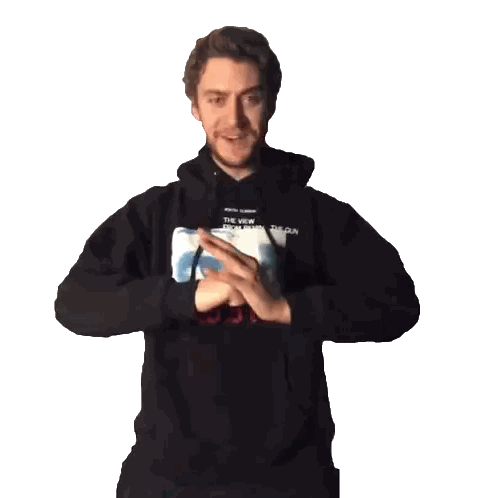 a man wearing a black hoodie that says uwu