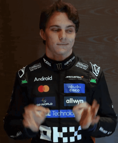 A Man Wearing A Black Jacket With Logos For Dell Technologies And Android GIF