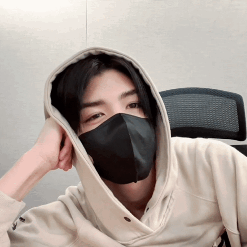 A Man Wearing A Black Mask And A Hoodie GIF