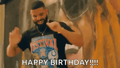 A Man Wearing A Black Shirt Is Dancing In Front Of A Painting And Says `` Happy Birthday '' . GIF