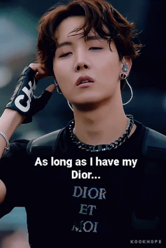 A Man Wearing A Black Shirt That Says " As Long As I Have My Dior ... " GIF