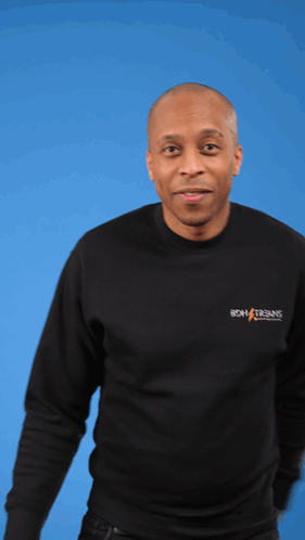 A Man Wearing A Black Shirt That Says Boh Streams Holds A Red Ball GIF