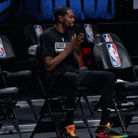 A Man Wearing A Black Shirt That Says Brooklyn Clapping GIF