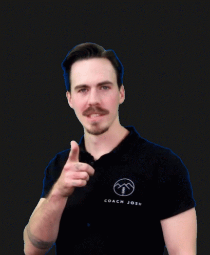 A Man Wearing A Black Shirt That Says Coach Josh Is Pointing At The Camera GIF