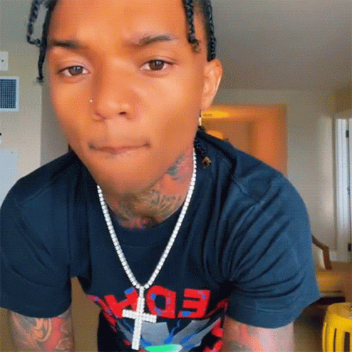 A Man Wearing A Black Shirt That Says Edx On It GIF