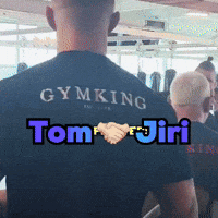 A Man Wearing A Black Shirt That Says Gymking GIF