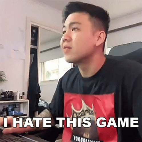 A Man Wearing A Black Shirt That Says I Hate This Game Is Sitting In Front Of A Computer GIF