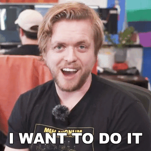 A Man Wearing A Black Shirt That Says I Want To Do It On It GIF
