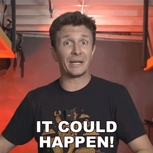 A Man Wearing A Black Shirt That Says It Could Happen On It GIF