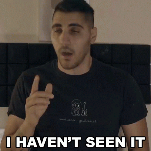 A Man Wearing A Black Shirt That Says Merluere Guitarist Says I Haven 'T Seen It GIF