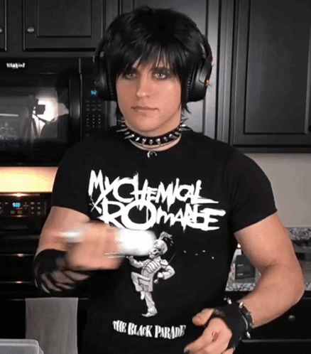 A Man Wearing A Black Shirt That Says Mychemical Romance On It GIF