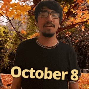 A Man Wearing A Black Shirt That Says October 8 On It GIF