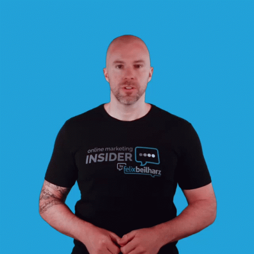 A Man Wearing A Black Shirt That Says Online Marketing Insider On It GIF