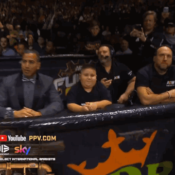 A Man Wearing A Black Shirt That Says " The " On It GIF