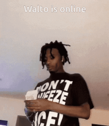 A Man Wearing A Black Shirt That Says Walto Is Online GIF