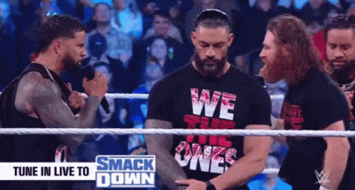 A Man Wearing A Black Shirt That Says We The Ones GIF