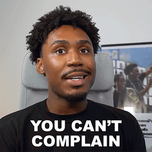 A Man Wearing A Black Shirt That Says " You Can 'T Complain " GIF