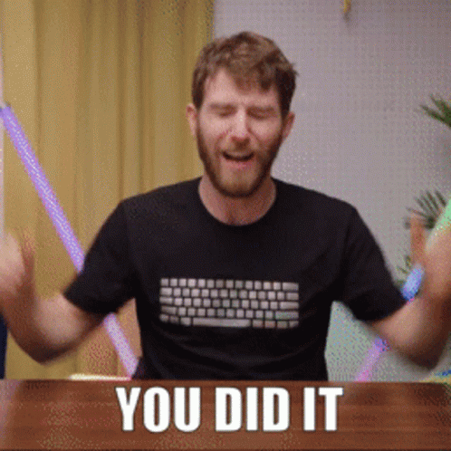 A Man Wearing A Black Shirt That Says " You Did It " On It GIF
