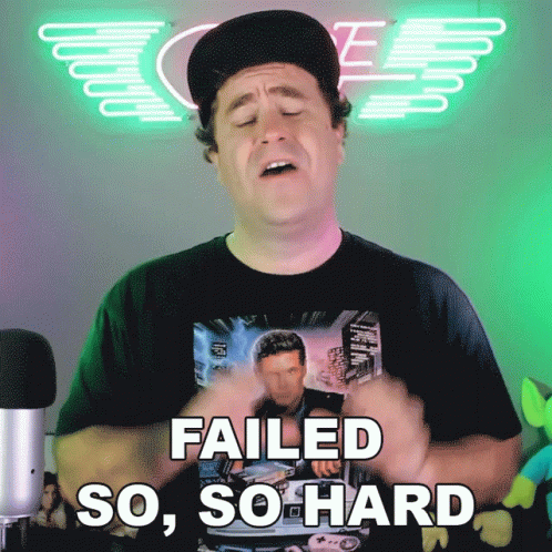A Man Wearing A Black Shirt With A Picture Of A Man On It Says Failed So So Hard GIF
