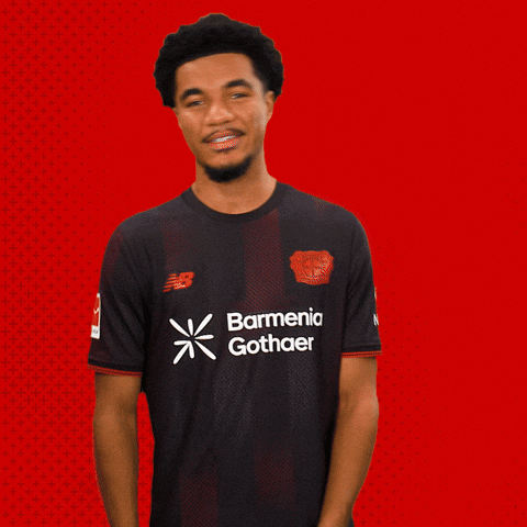 a man wearing a black shirt with the word birmingham on it