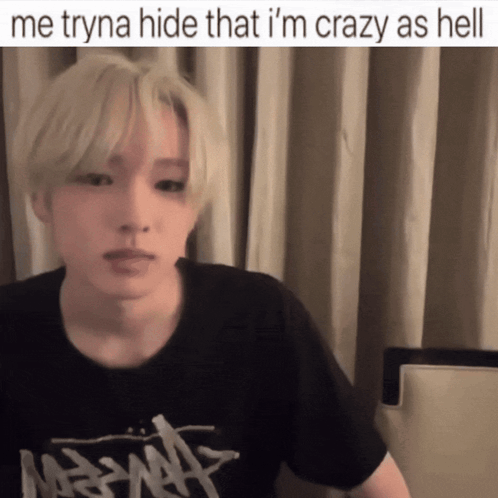 A Man Wearing A Black Shirt With The Words Me Tryna Hide That I 'M Crazy As Hell On The Bottom GIF