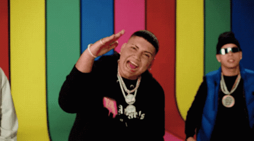 A Man Wearing A Black Sweatshirt That Says Angels On It GIF