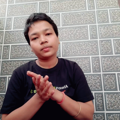 A Man Wearing A Black T-Shirt That Says Eyewia GIF