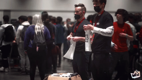A Man Wearing A Black T-Shirt That Says ' Nly ' On It GIF