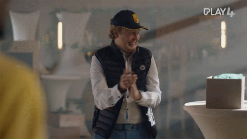 A Man Wearing A Black Vest And A Hat With The Word Play On The Bottom GIF