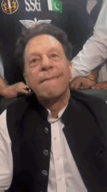 A Man Wearing A Black Vest With The Word Ssg On It Is Making A Face GIF
