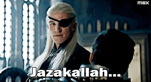 A Man Wearing A Blindfold Says Jazakallah GIF