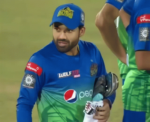 A Man Wearing A Blue And Green Jersey With Pepsi On It GIF