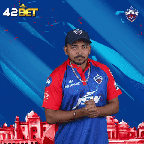 A Man Wearing A Blue And Red Jersey With The Word Delhi Carnival On It GIF
