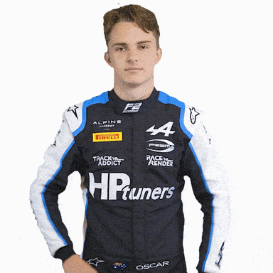A Man Wearing A Blue And White Jacket With Hp Tuners On It GIF