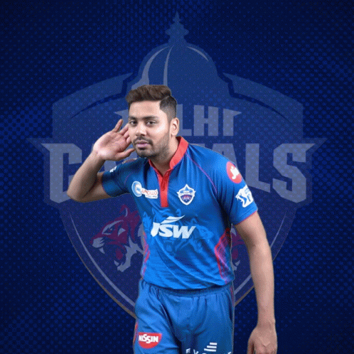 A Man Wearing A Blue Delhi Capitals Jersey GIF