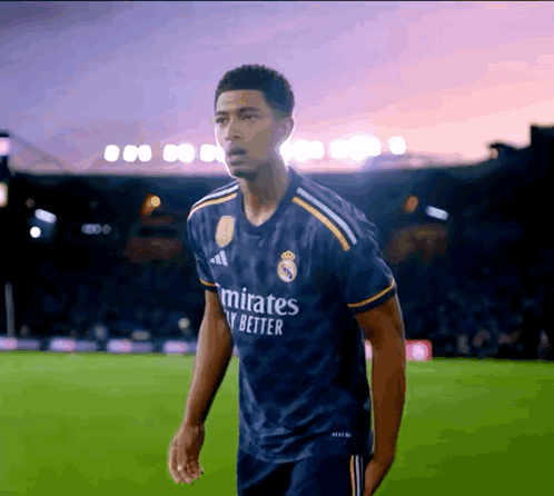 A Man Wearing A Blue Emirates Fly Better Jersey GIF