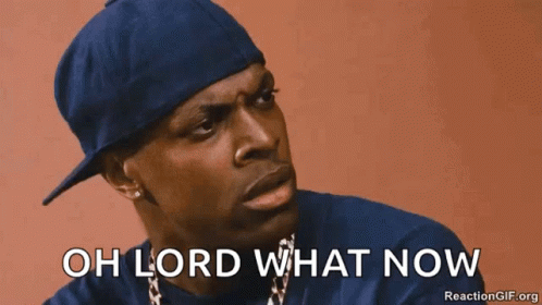 A Man Wearing A Blue Hat And Chains Has The Words Oh Lord What Now Below Him GIF