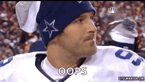 A Man Wearing A Blue Hat With A Star On It Says " Oops " GIF