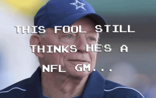 A Man Wearing A Blue Hat With The Words This Fool Still Thinks He 'S A Nfl Gm Written On It GIF
