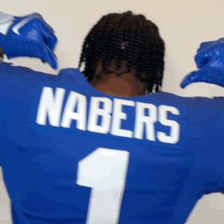 A Man Wearing A Blue Nabers Jersey With The Number 1 On It GIF