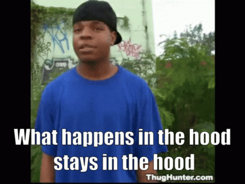 A Man Wearing A Blue Shirt And A Black Hat Says What Happens In The Hood GIF