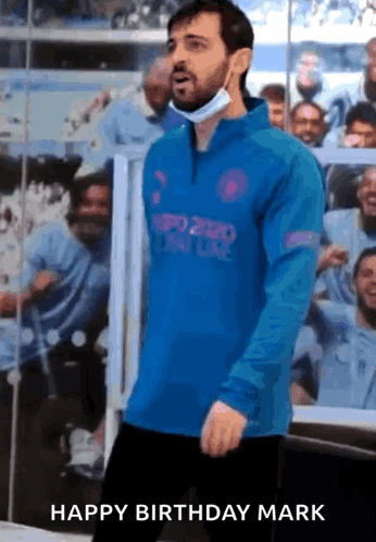 A Man Wearing A Blue Shirt That Says Happy Birthday Mark On It GIF