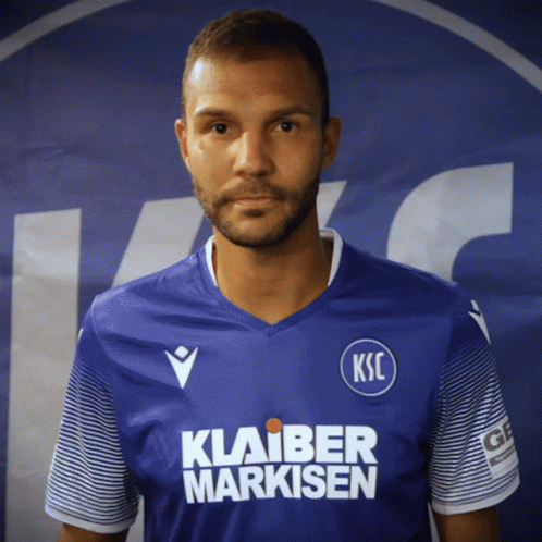 A Man Wearing A Blue Shirt That Says Ksc GIF