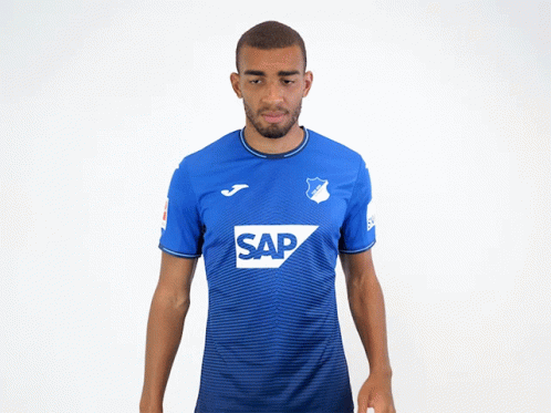 a man wearing a blue shirt that says sap