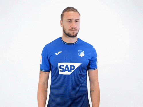 A Man Wearing A Blue Shirt That Says Sap GIF