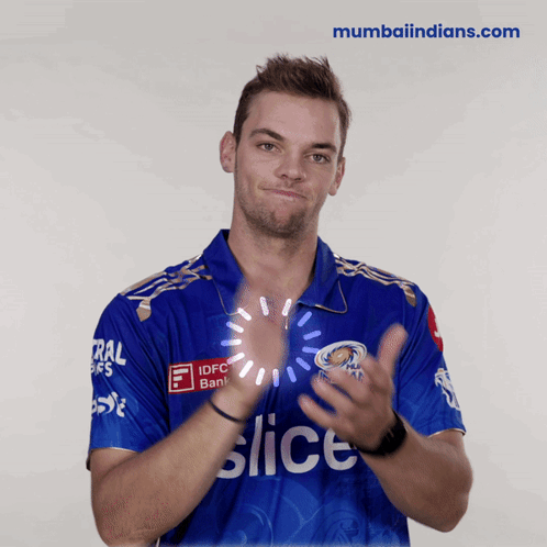 A Man Wearing A Blue Shirt That Says Slice Is Clapping His Hands GIF