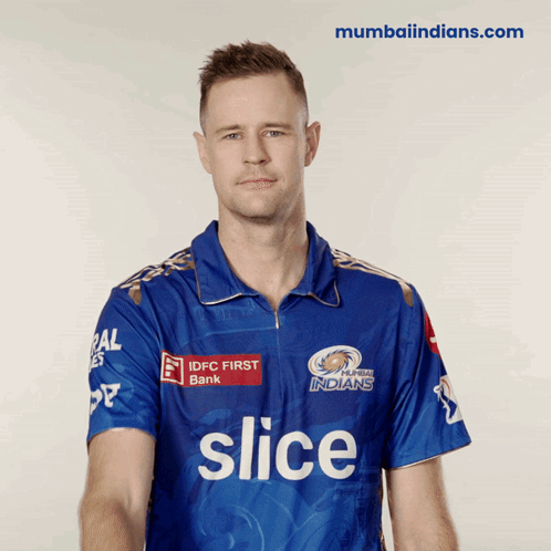 A Man Wearing A Blue Shirt That Says Slice On The Front GIF