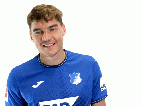 A Man Wearing A Blue Shirt That Says Tsg 1899 GIF